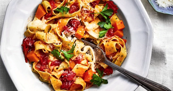 Parsley egg noodles with squash-and-tomato sugo