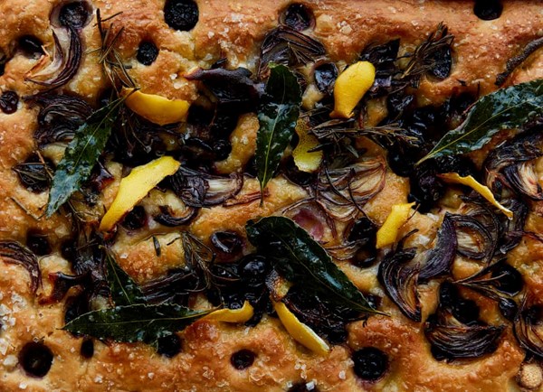 Party focaccia with lemon, roast onions and grapes