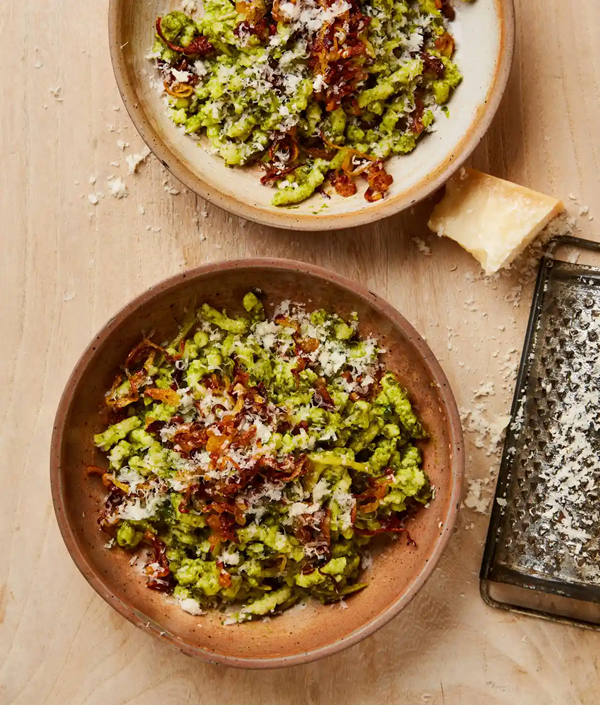 Passatelli with kale pesto and shallots