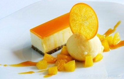 Passion fruit and white chocolate cheesecake with fresh orange sorbet