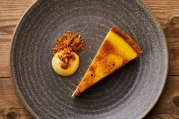 Passion fruit tart with praline crumb