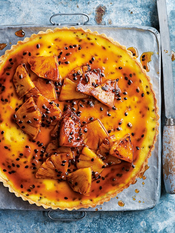 Passionfruit tart with caramelised rum pineapple