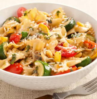 Pasta and summer squash with tomatoes, basil, and pine nuts