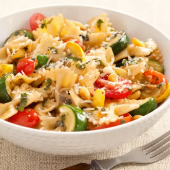 Pasta and summer squash with tomatoes, olive, and feta