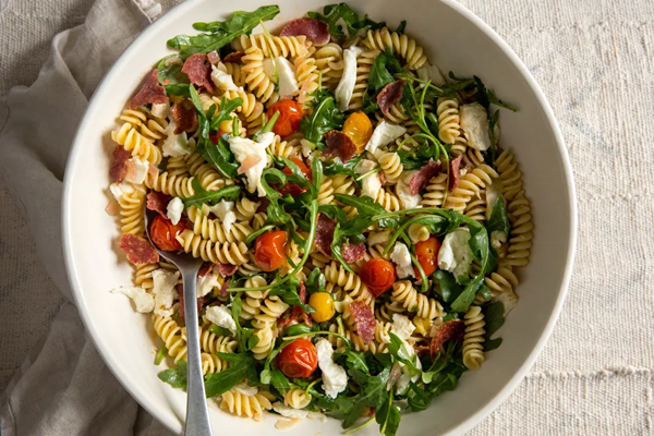 Pasta salad with crispy salami & cherry tomato vinaigrette