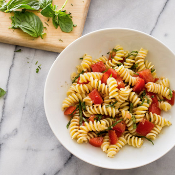 Pasta salad with fresh tomatoes and basil