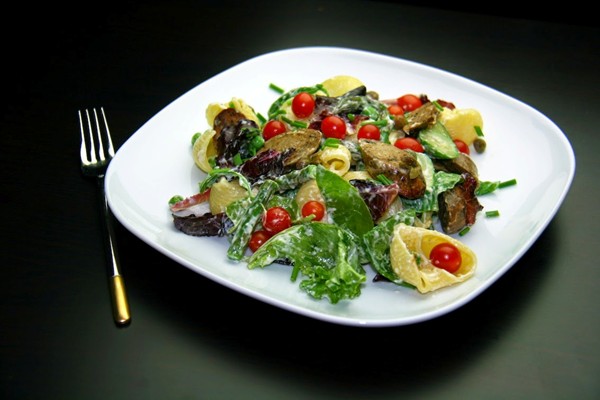 Pasta salad with Quorn wild garlic sausages, courgette, peas and asparagus and a lemon yoghurt dressing