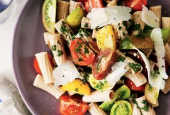 Pasta salad with summer heirloom tomatoes, basil oil and pecorino