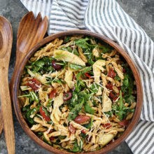 Pasta salad with sun-dried tomatoes, artichokes, and olives