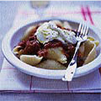 Pasta shells with spicy sausage and tomato sauce