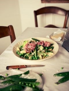 Pasta shells with spring greens, mâche, and prosciutto