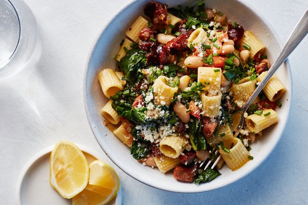 Pasta with andouille sausage, beans and greens [Vallery Lomas]