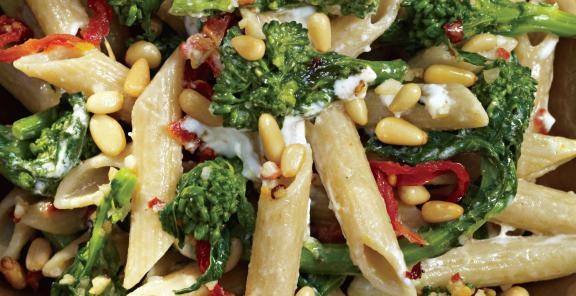 Pasta with broccoli rabe, goat cheese, sun-dried tomatoes, and toasted pine nuts