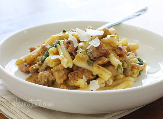 Pasta with butternut sauce, spicy sausage and baby spinach