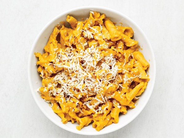 Pasta with carrot sauce and ricotta salata 