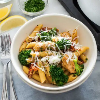 Pasta with chicken, broccoli, and sun-dried tomatoes