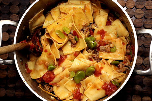 Pasta with favas, tomatoes and sausage