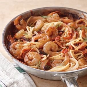 Pasta with fennel, tomatoes, olives, and shrimp