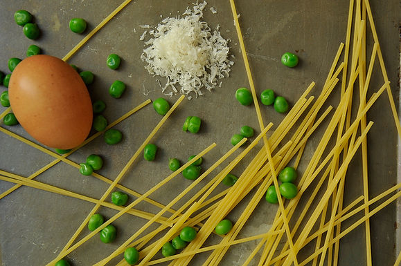 Pasta with leeks, peas, parmesan, and a fried egg