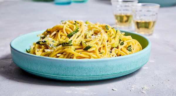 Pasta with pecorino-zucchini sauce and basil