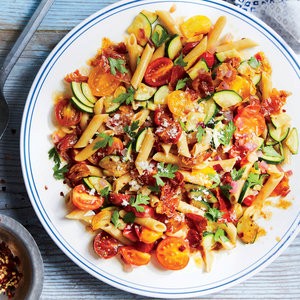 Pasta with prosciutto, cherry tomatoes, and Asiago