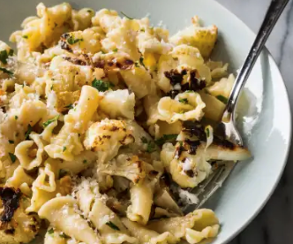 Pasta with roasted cauliflower, garlic, and walnuts