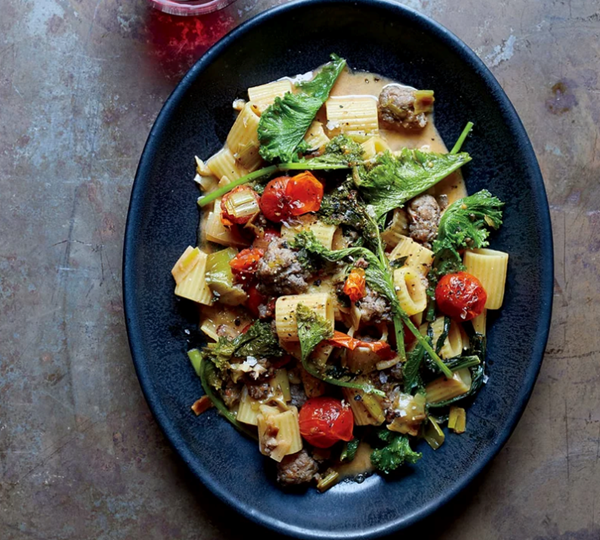 Pasta with sausage and mustard greens