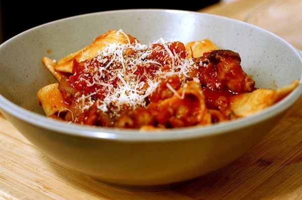 Pasta with sausage, tomatoes and mushrooms