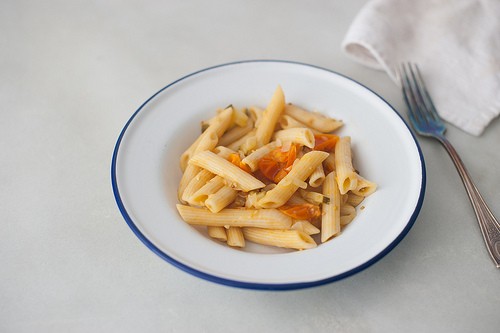 Pasta with sun gold tomatoes and onion