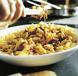 Pasta with tomato-beef sauce with cinnamon, colves, and parsley