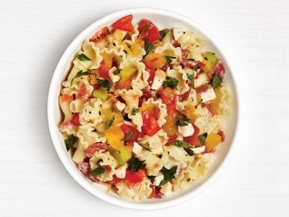 Pasta with tomatoes, salami and smoked mozzarella