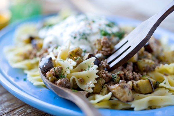 Pasta with Turkish-style lamb, eggplant, and yogurt sauce