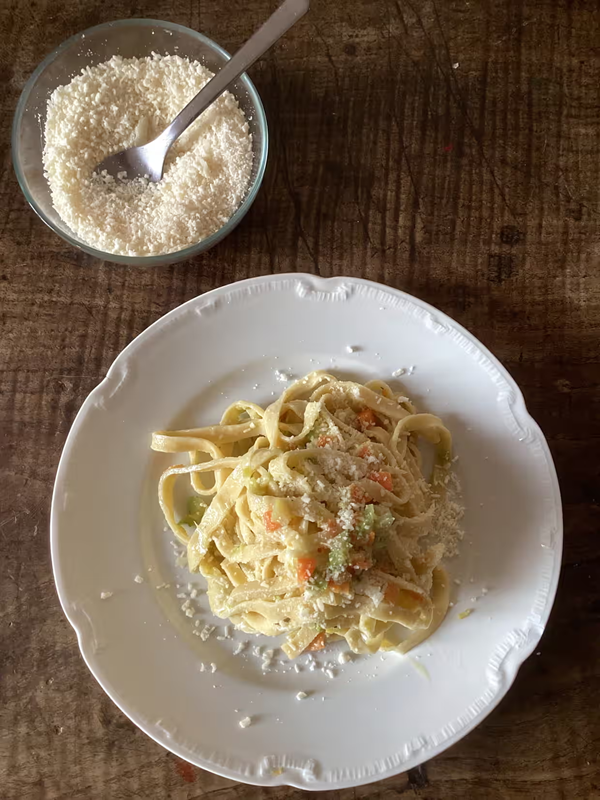 Pasta with vegetable ragu and Parmesan cream