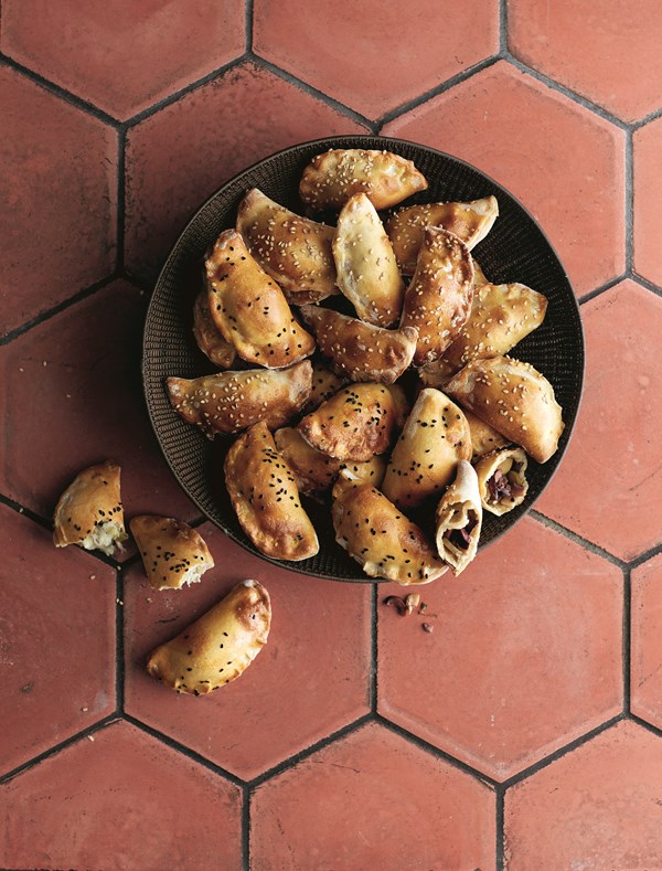 Pastries stuffed with feta & halloumi or olives (Samboussek)