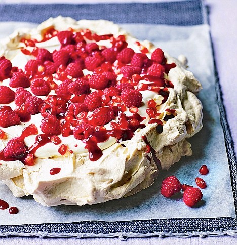Pavlova with pomegranates and raspberries