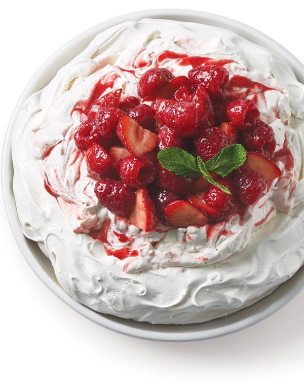 Pavlova with red berry sauce