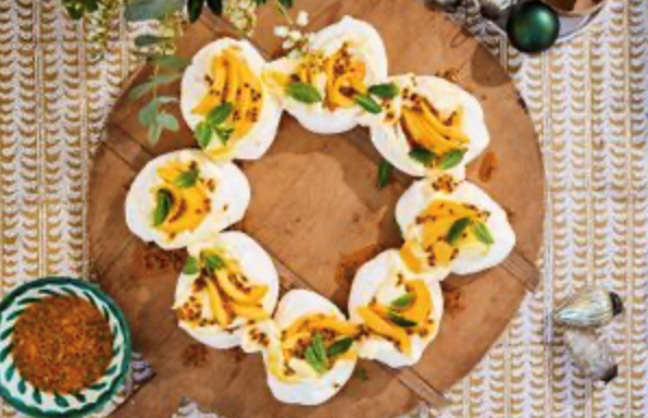 Pavlova wreath with mango cream and passionfruit mint syrup [Lauren and Andy Emerson]