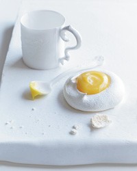 Pavlovas with passion fruit curd