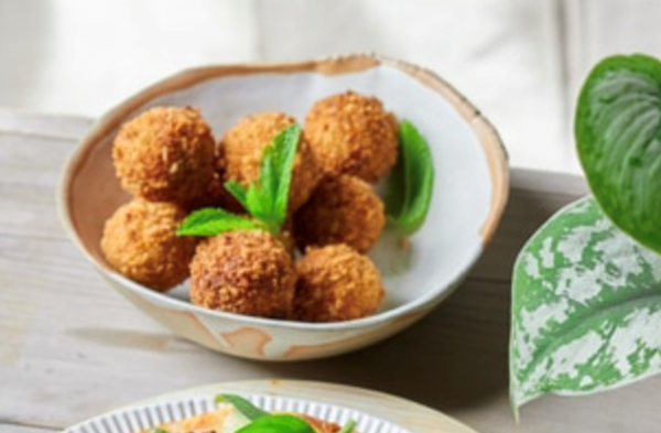 Pea and cauliflower croquettes with yoghurt and mint