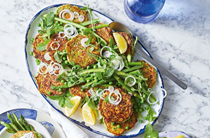 Pea and mint fritters with feta and asparagus