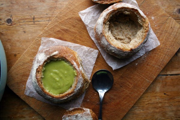 Pea and mint soup in a crusty bread bowl