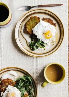 Pea breakfast fritters w/fried egg, greens + smoked yogurt