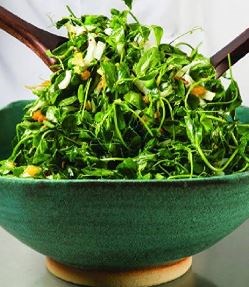 Pea green salad with warm apricot-pistachio vinaigrette