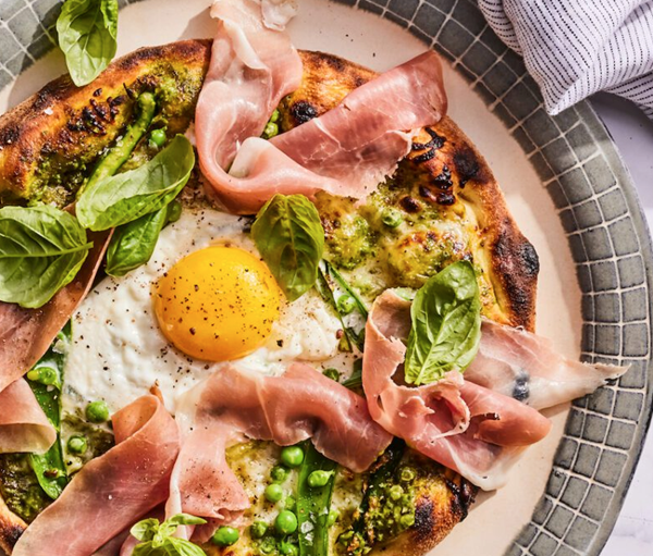 Pea prosciutto spring pizza
