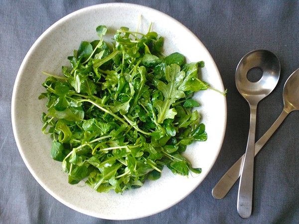 Pea shoot and baby arugula with Meyer lemon vinaigrette