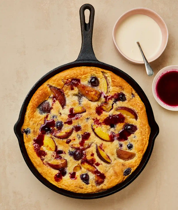 Peach and grape flaugnarde with vanilla cream