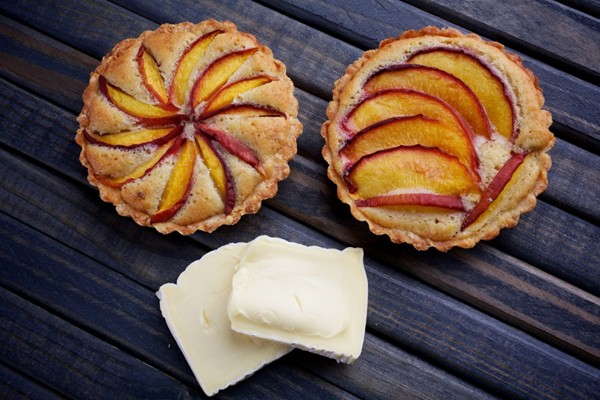 Peach and pine nut tarts with triple-cream cheese