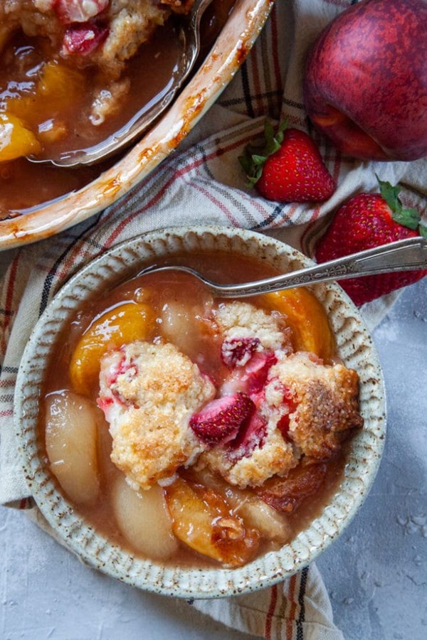 Peach and Prosecco cobbler with strawberry biscuits