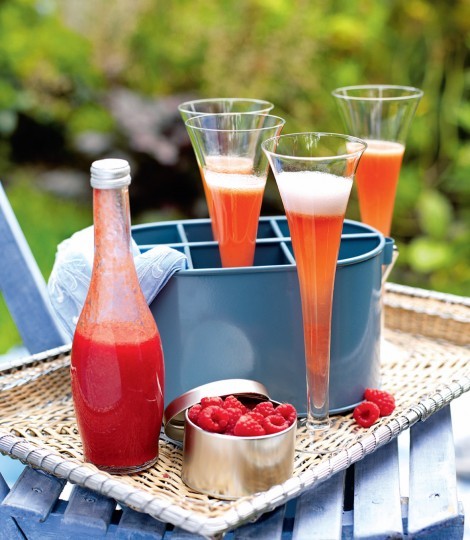 Peach and raspberry Champagne cocktail