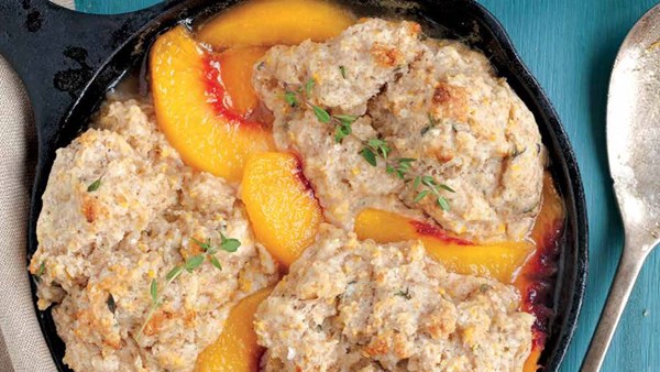 Peach breakfast cobbler with cornmeal thyme biscuits